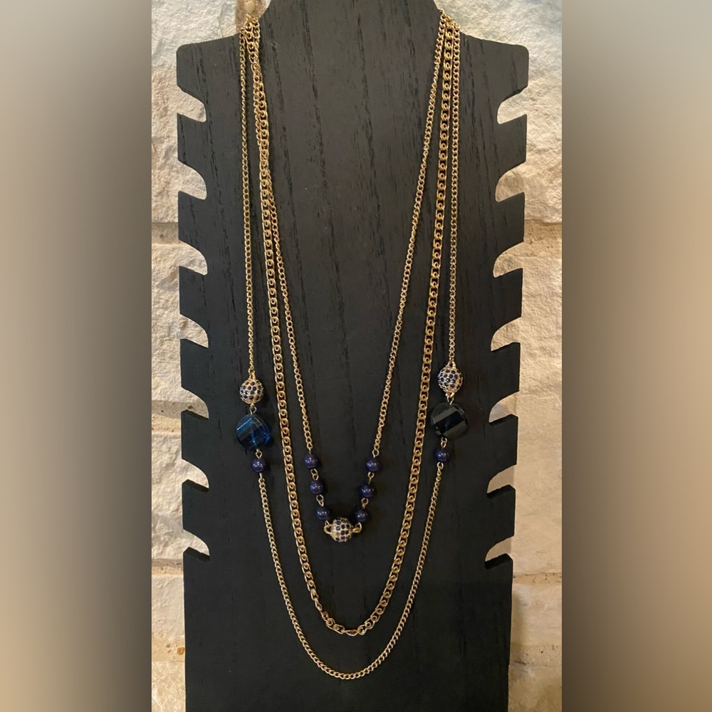 Like new, worn once, 20 inch navy blue and gold, 3 multi length chain necklace